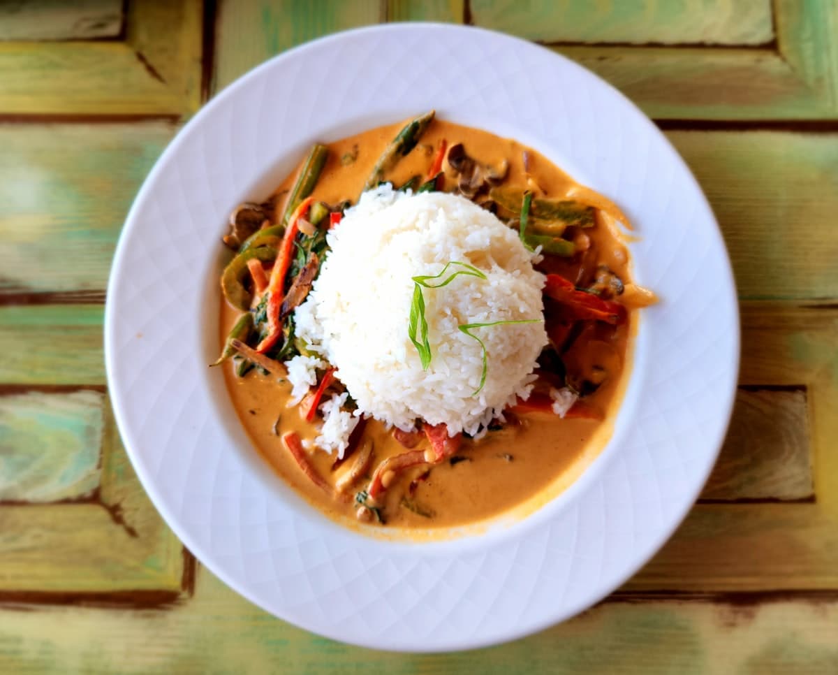 Thai lunch plate with rice, salad, and protein